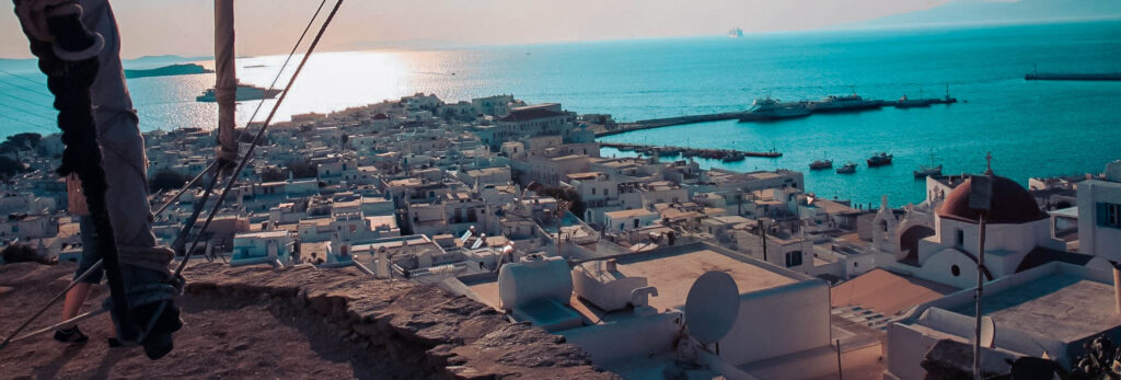 Stunning panoramic view over the Mediterranean above the rooftops of a Greek town