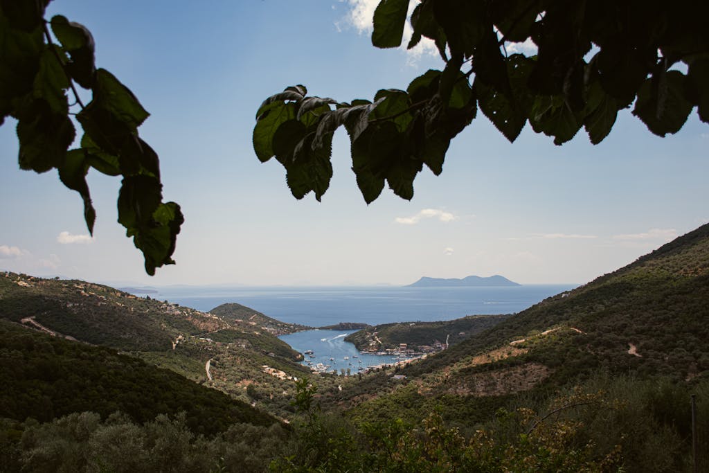 Breathtaking view of Syvota's coastline with lush green mountains and the serene sea.